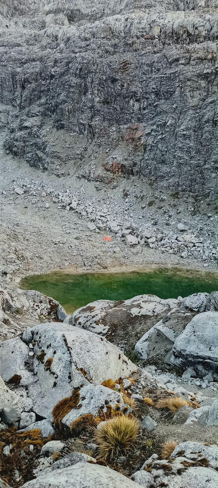 Moraine Camp (4,900 m) next to the glacial lake