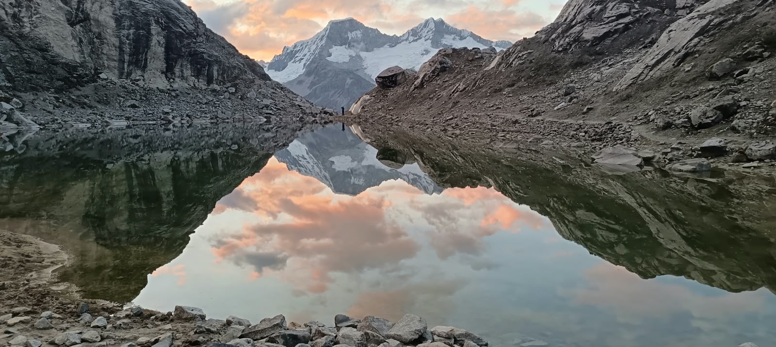 Glacial lake at the Moraine Camp at sunset