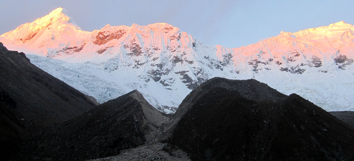 Sunrise over the snow peaks of the Ishinca valley